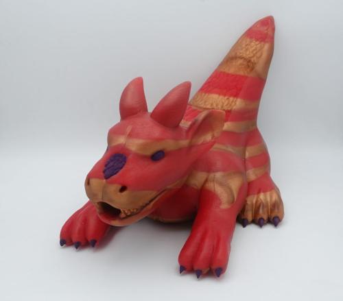 Draggy, Metallic Red / Bronze Marble, Dark purple eyes, nose patch, claws, pawpads